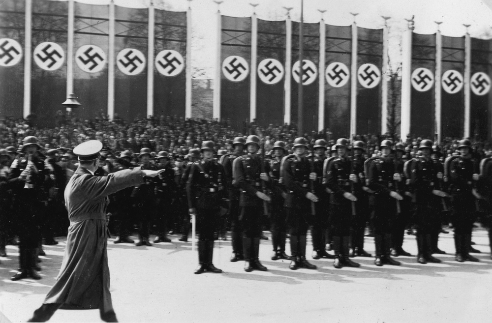 Adolf Hitler salutes his honor guard in Berlin's Lustgarden during the May Day celebration